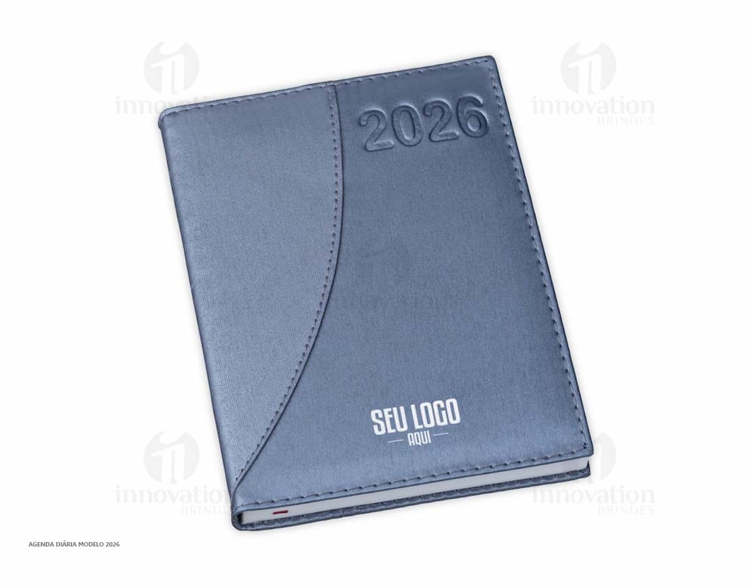 Agenda diária para o ano de 2025, capa vermelha com design minimalista e páginas em branco para anotações.