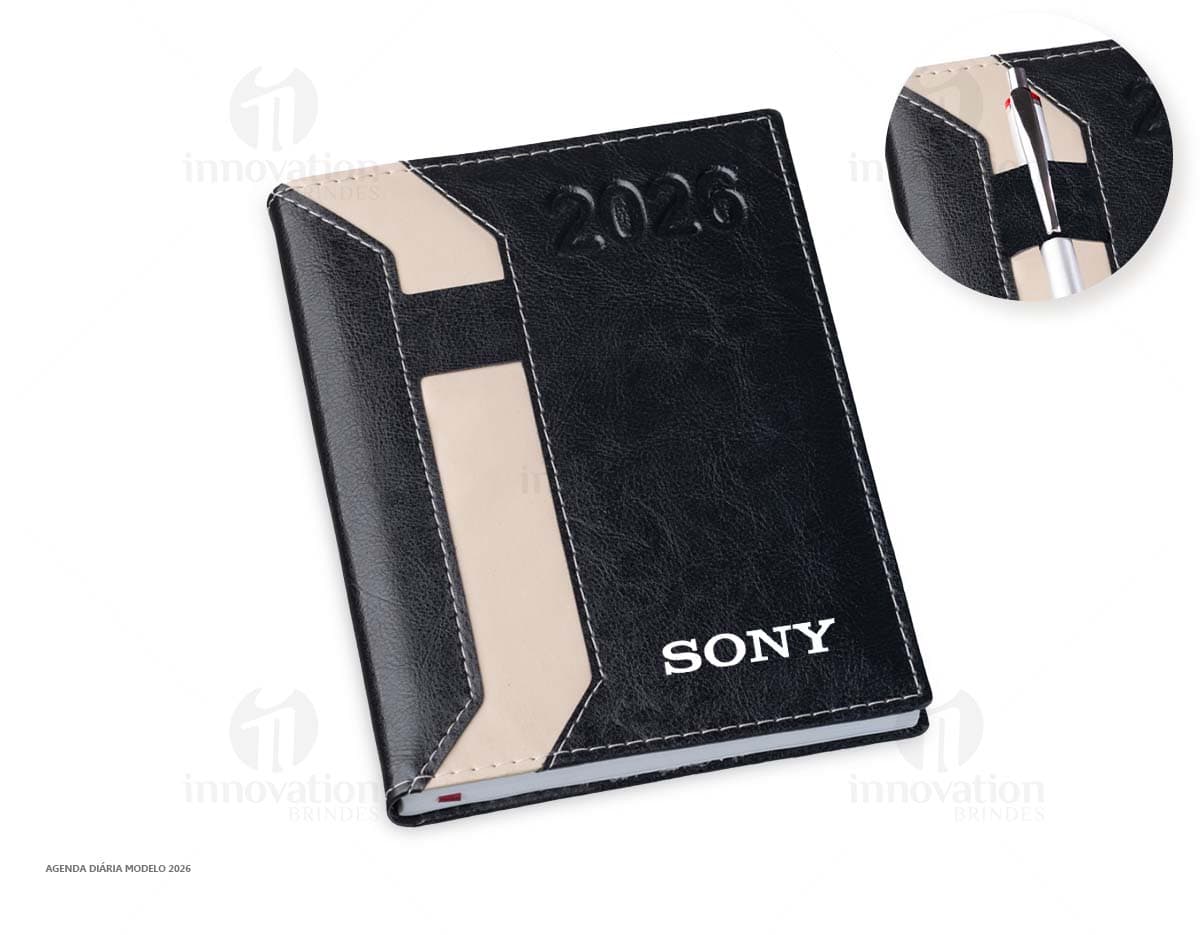 Agenda em couro preto com suporte para caneta.