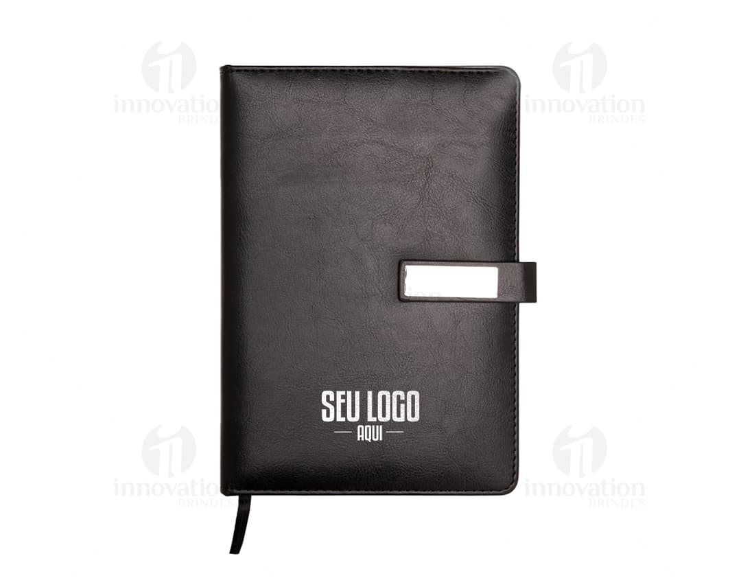 Cuaderno de cuero sintético negro, ideal para negocios. Posee papel en blanco, estuche para guardar dinero, documentos y