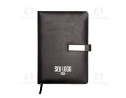Cuaderno de cuero sintético negro, ideal para negocios. Posee papel en blanco, estuche para guardar dinero, documentos y