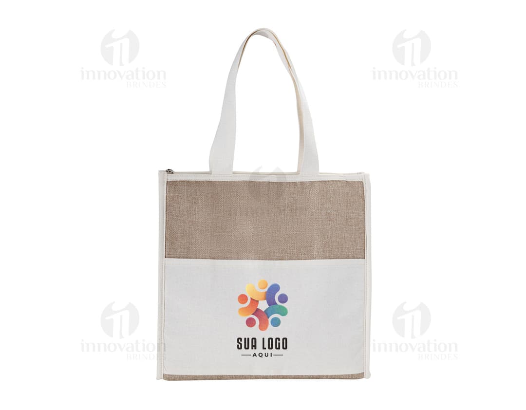 Bolsa Térmica de algodón y yuta en embalaje de cartón abierto, vacío, con cinta de regalo.
