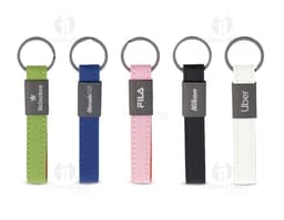 Synthetic leather keychain with silver metal details, modern and durable design. Ideal for securely and conveniently carrying