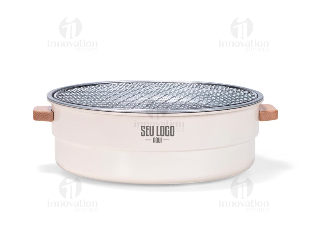 Shiny silver metal portable grill, close-up kitchen equipment. Ideal for preparing food while enjoying the outdoors or in a