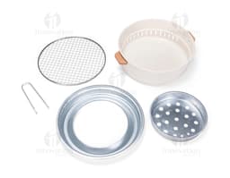 Shiny silver metal portable grill, close-up kitchen equipment. Ideal for preparing food while enjoying the outdoors or in a