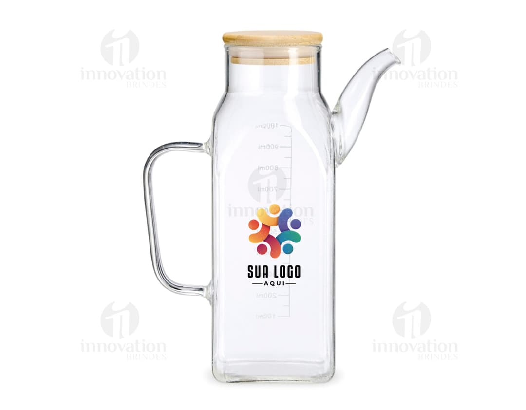 Carafe en verre borosilicate de 1 litre transparente, avec poignée et couvercle en plastique.