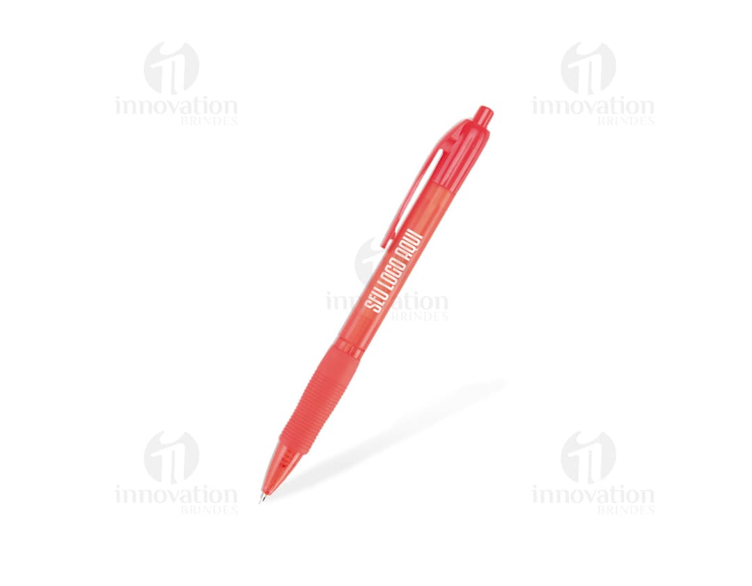 Colorful plastic pen highlighted on a white sheet of paper, alongside other writing and drawing materials, including pencils