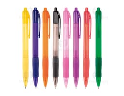 Colorful plastic pen highlighted on a white sheet of paper, alongside other writing and drawing materials, including pencils
