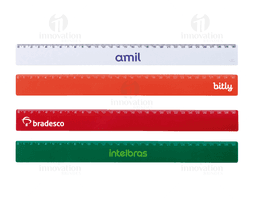 Régua plástica de 30cm colorida com elementos gráficos e design moderno, com listras coloridas em tons de amarelo, laranja