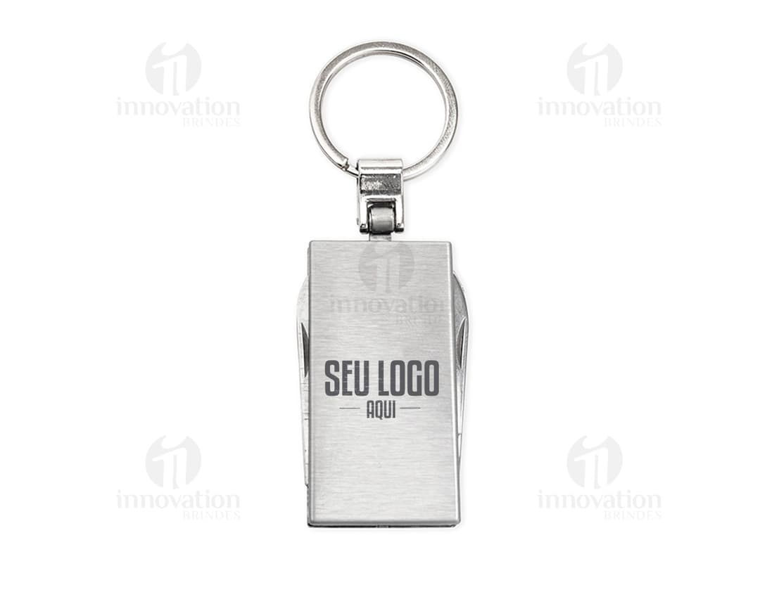 Photo of a keychain multi-tool with 4 functions, a metal object with various utilities, including closure, protection, and