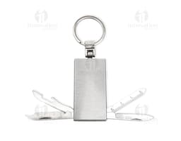 Photo of a keychain multi-tool with 4 functions, a metal object with various utilities, including closure, protection, and
