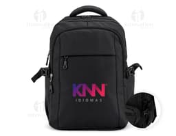 Black leather backpack and fanny pack, ideal for travel, business, and leisure. A suited man holds the backpack's handle