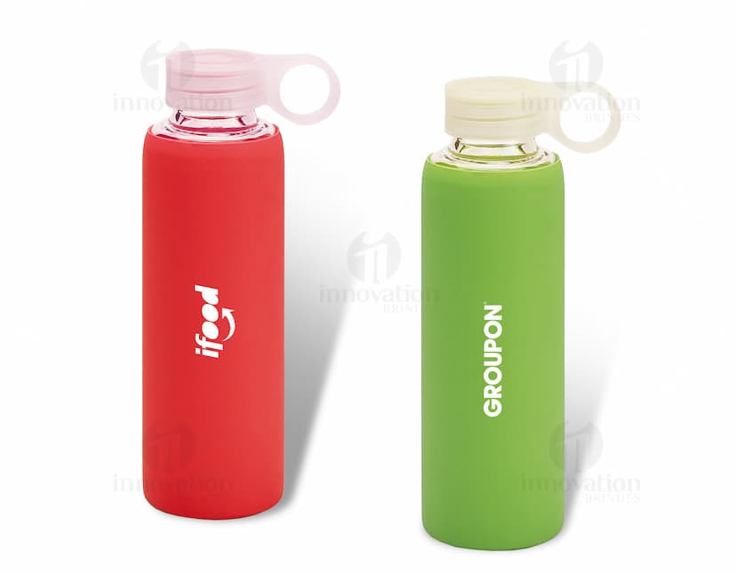 Toiletry bottle made of glass, containing lotion, perfume, and liquid. Transparent with a cap. Clean and hygienic, suitable for storing deodorant, shampoo, or hair spray. Can also be used for beverage or water. Reflective surface and clear label design. Ideal for health and body care products.