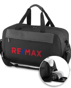 Mala esportiva preta moderna com alça de couro, compartimento molhado, fecho de zíper, ideal para viagens e atividades esportivas.