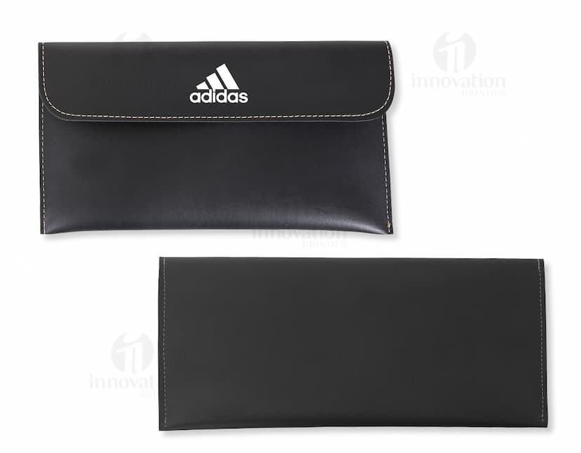 Pasta envelope de couro marrom para escritório e negócios. Ideal para armazenar dinheiro, documentos e objetos pessoais. Design elegante e textura de alta qualidade. Adquira já a sua!