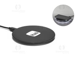 Fast wireless charger in black ABS for electronic devices, modern technology, wireless, black, and portable.