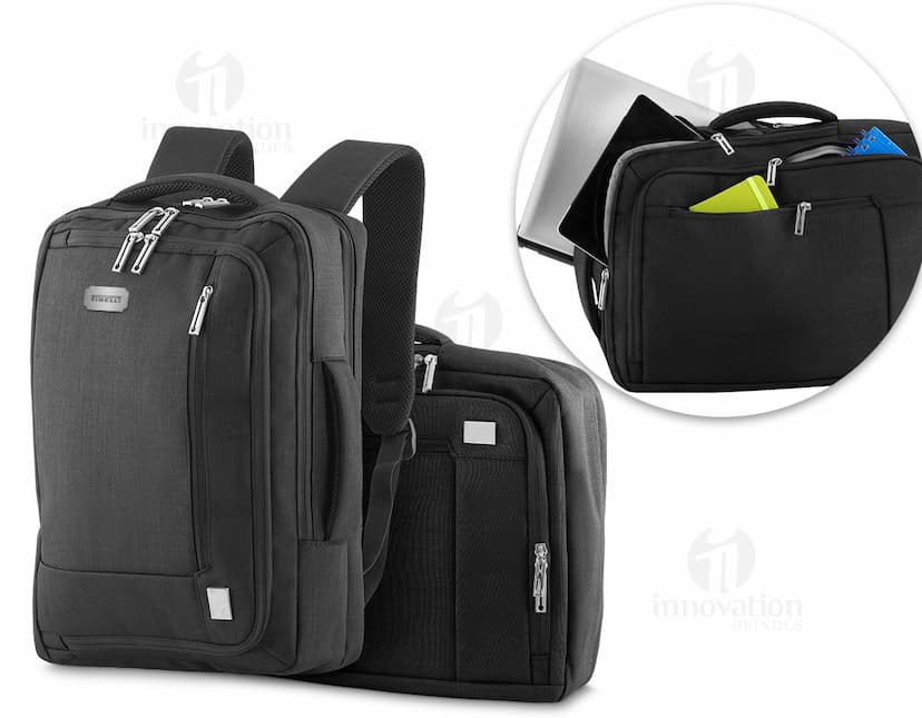 Mochila para notebook em couro preto moderna, perfeita para viagens de negócios e fotografia profissional. Com compartimentos espaçosos e design elegante, é o acessório ideal para quem busca praticidade e estilo. Garanta já a sua!