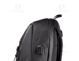 Synthetic leather laptop backpack, perfect for business or leisure travel. Modern and spacious, with a padded compartment to