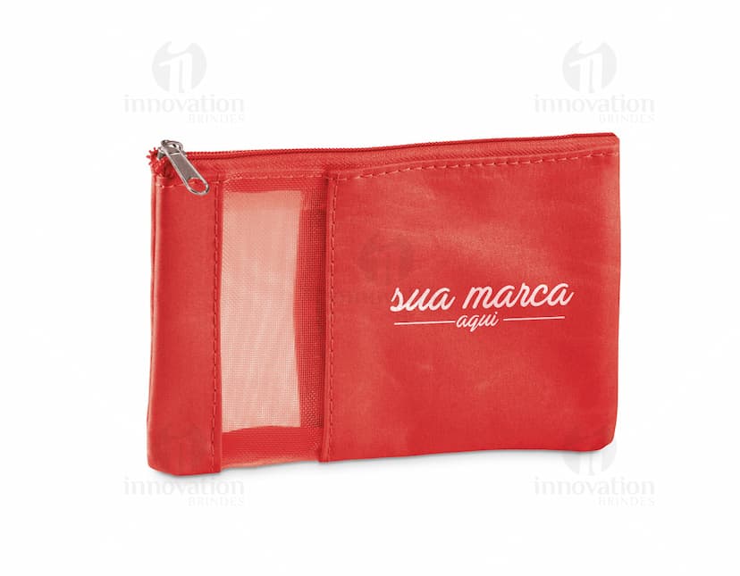 Necessaire de microfibra com vários bolsos, ideal para guardar objetos pessoais. Feita em material resistente e elegante, perfeita para presentear ou para uso pessoal em viagens ou no dia a dia.
