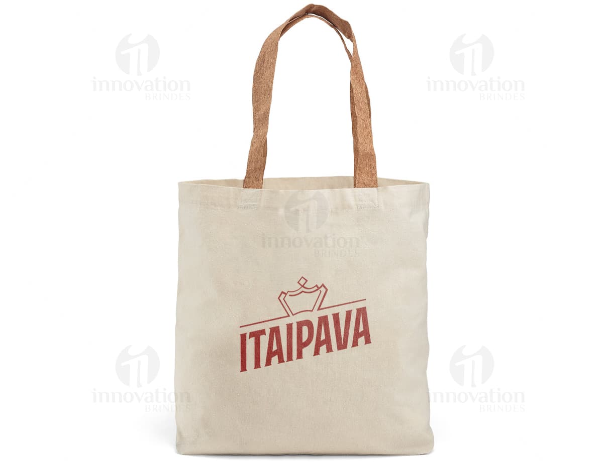 Sacola de algodão marrom com alças de cortiça, vazia e aberta. O design é elegante e moderno, perfeito para compras ou presentes. O material é resistente e possui um detalhe de padlock para segurança. A textura é vintage e grunge, dando um toque de estilo retro.