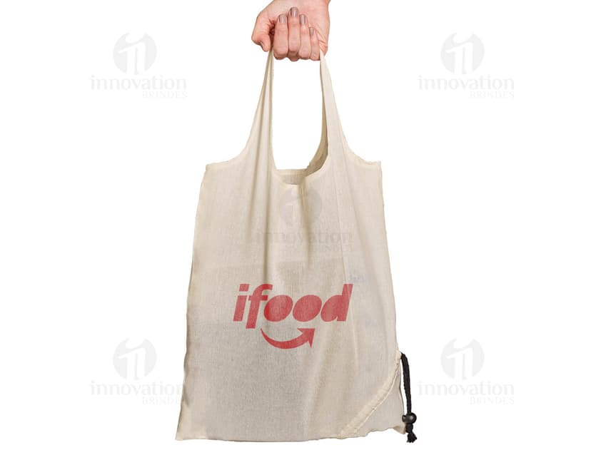 Bolsa de compras de algodão marrom vazia, dobrável e durável, com alça de couro e fecho de metal. Perfeita para compras, presente ou uso diário.