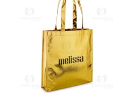 Luxury brown leather tote bag measuring 340 x 350 mm, featuring metal details and a combination lock for added security. The