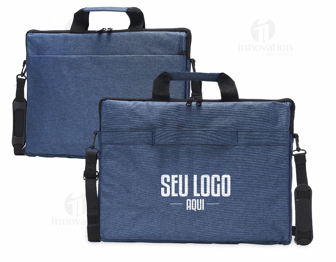 Mala de negócios em couro preto, com alça e fecho de metal. Perfeita para armazenar e transportar objetos pessoais, como notebooks de 15,6 polegadas. Elegante e moderna, ideal para viagens a trabalho ou compras.