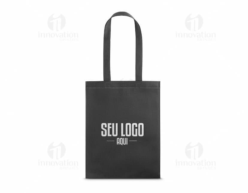 SACOLA 270 x 350 mm amarela com design fashion em uma boutique de shopping, protegida por um cadeado e etiqueta de segurança. O produto está dentro de uma embalagem de metal seguro e protegido.