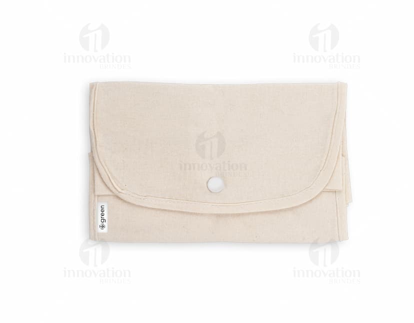 Bolsa de algodão reciclado dobrável, com design vintage. Feita de material eletrônico antigo, com espaço vazio para colocar documentos e objetos diversos. Cor marrom e amarela, com detalhes em plástico e metal. Ideal para uso no escritório, escola ou em viagens.
