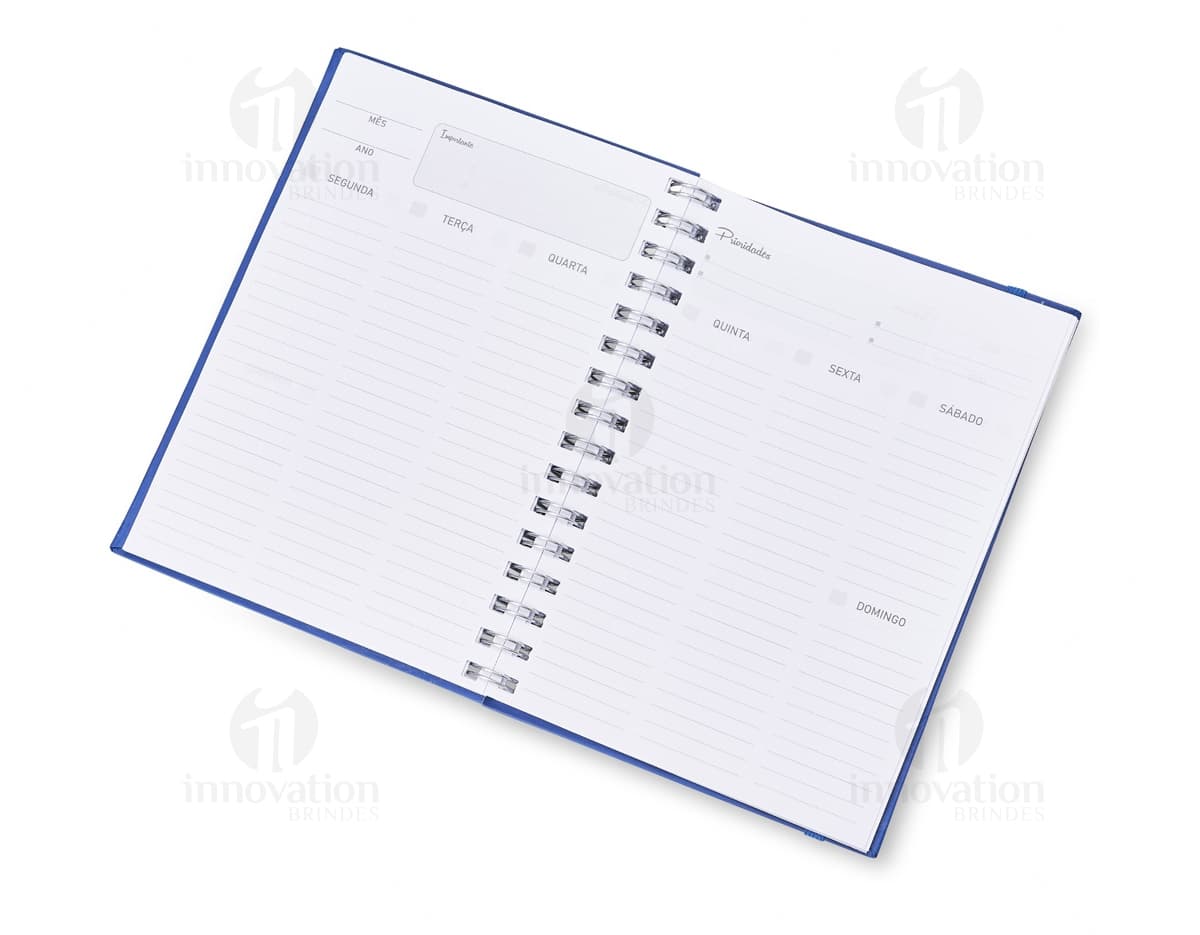 Caderno Planner preto com páginas em branco e marcador de páginas colorido.