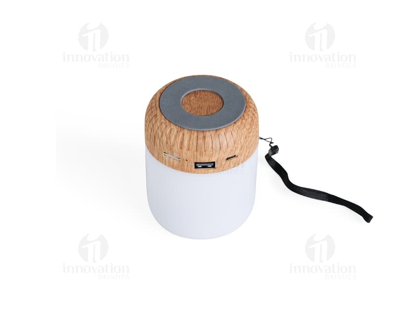 Caixa de som multimídia de alta qualidade para brindes corporativos. Aproveite a potência do som e a modernidade do design para impressionar seus clientes. Ideal para eventos, escritórios e promoções. Garanta já a sua!