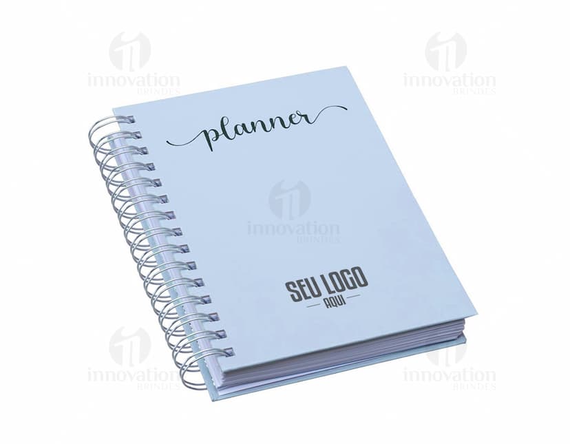Planner anual em percalux com calendários.