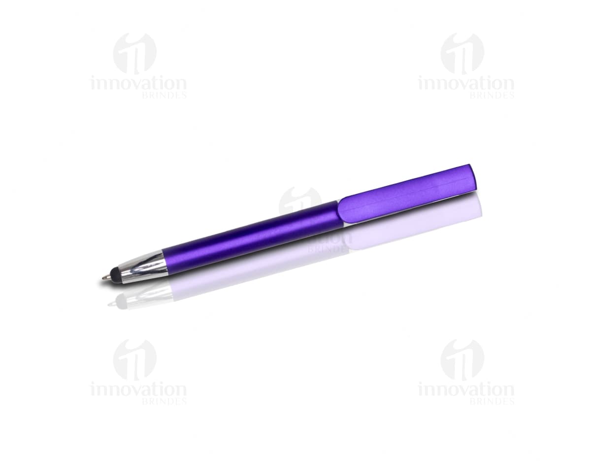 Caneta plástica touch com suporte em um ambiente de escritório com papel, dispositivo eletrônico, calculadora e itens de papelaria.