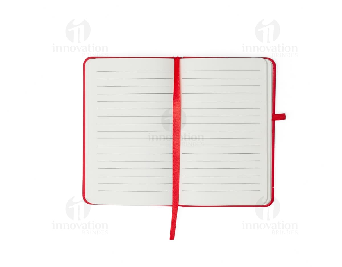 Caderneta emborrachada com porta caneta, ideal para quem busca organização e praticidade no dia a dia. Perfeita para anotações de reuniões de negócios, estudos ou simplesmente para registrar suas ideias. Com design moderno e elegante, esta caderneta é o brinde perfeito para mostrar sua marca em eventos corporativos. Adquira já a sua e esteja sempre preparado para colocar suas ideias no papel.