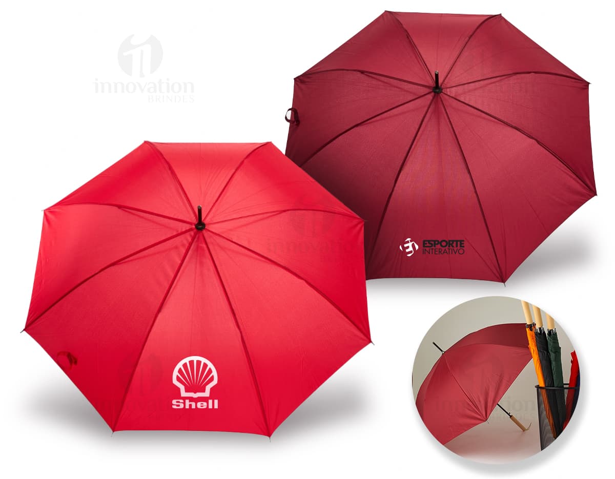 Guarda chuva automático em design moderno e colorido, com estampa de textura e padrão em tons de laranja, amarelo e preto. Possui cabo único e abertura automática, sendo um objeto artístico e criativo para proteção contra chuva e sol.