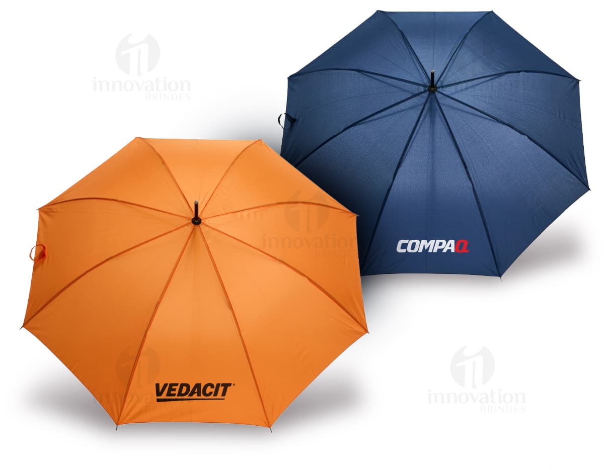 Guarda chuva automático em design moderno e colorido, com estampa de textura e padrão em tons de laranja, amarelo e preto. Possui cabo único e abertura automática, sendo um objeto artístico e criativo para proteção contra chuva e sol.