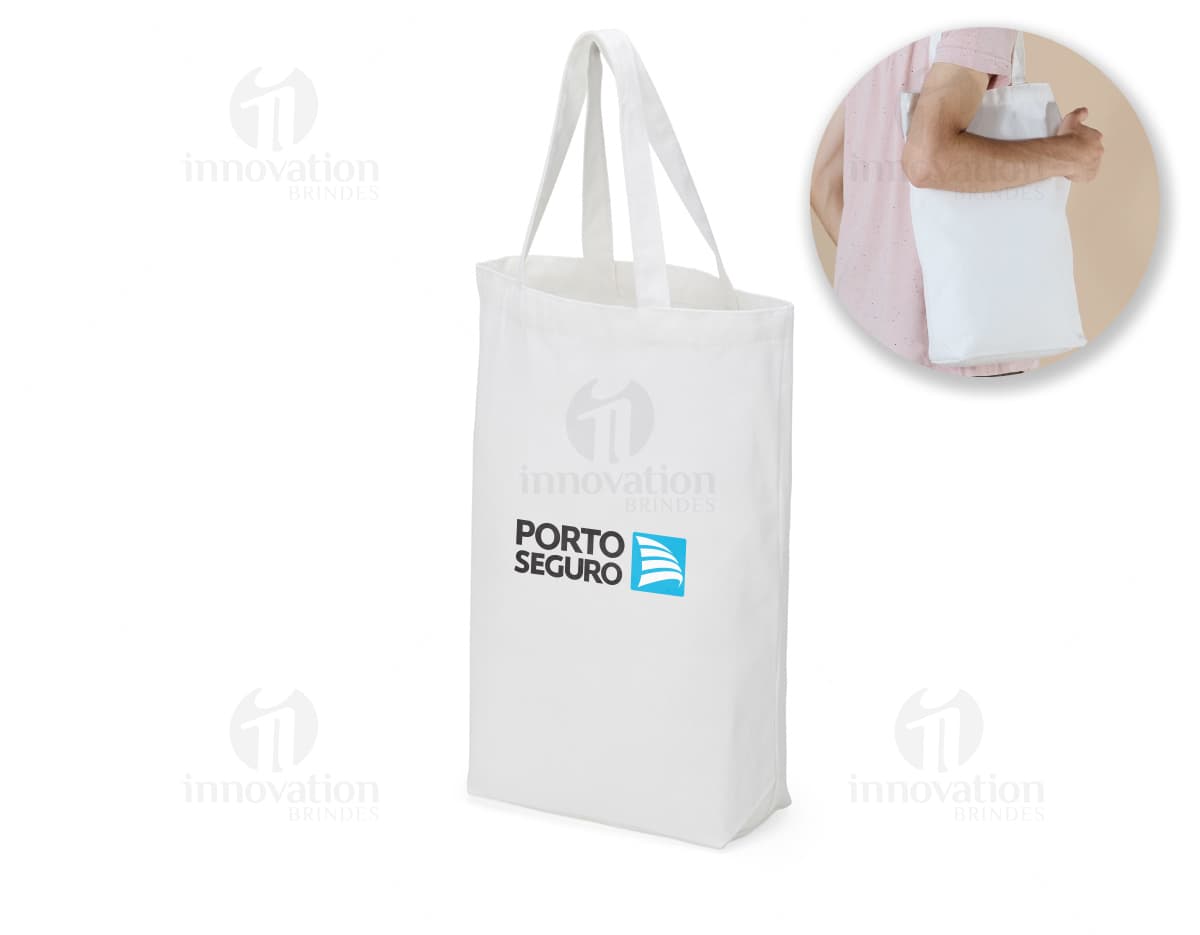 Sacola de algodão com alças internas, ideal para carregar compras no shopping. A embalagem é feita de papel, vazia e vem com etiqueta. Ótima opção para presentes, pode ser usada para transportar produtos de forma segura.