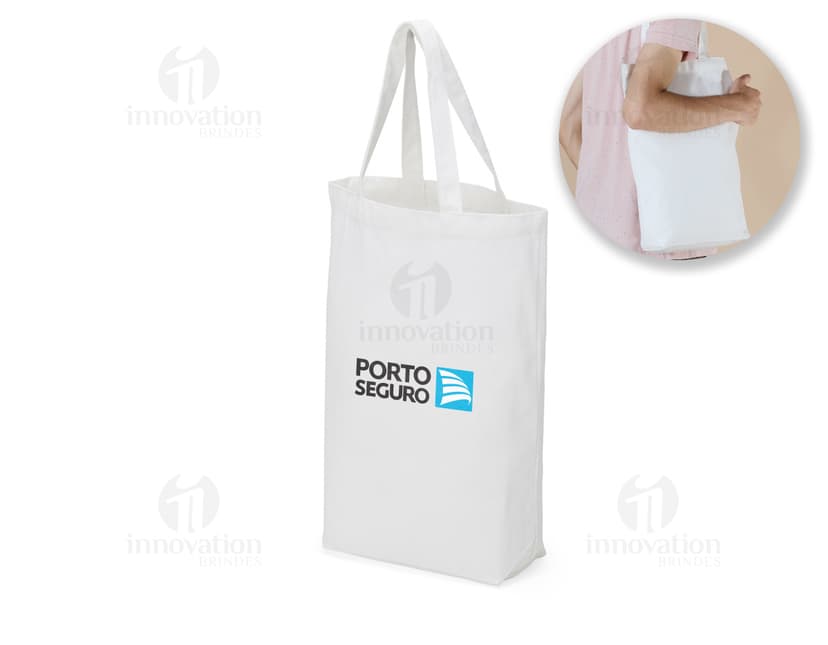 Sacola de algodão com alças internas, ideal para carregar compras no shopping. A embalagem é feita de papel, vazia e vem com etiqueta. Ótima opção para presentes, pode ser usada para transportar produtos de forma segura.