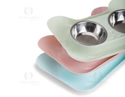Tigela de aço inoxidável para animais com design moderno e brilhante, feita de metal prateado e circular. A imagem mostra uma
