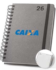 Agenda com argolas para o ano de 2026, na cor preta e com detalhes em dourado.