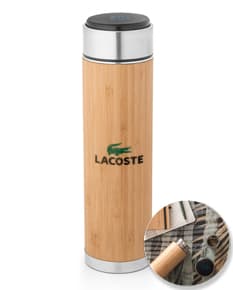 Bottle and glass container in stainless steel for a thermal squeeze. Transparent with a label, suitable for storing beverages like wine, beer or other drinks. Shiny and reflective, ideal for use in bars, restaurants or spa. Yellow and golden color, suitable for cold or hot beverages. Ideal for personal hygiene or care products like shampoo or lotion. Made of metal with a shiny and luxurious appearance.