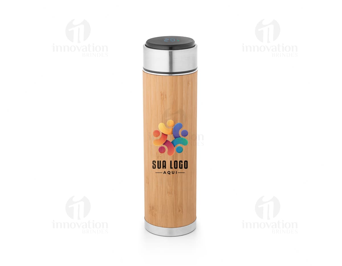 Squeeze térmico em aço inox, com design elegante e pura funcionalidade. Objeto de metal brilhante, ideal para manter sua bebida fresca ou quente por mais tempo. Cor prateada, com detalhes em amarelo, e com tampa transparente. Perfeito para uso no banheiro, academia, spa ou em viagens.