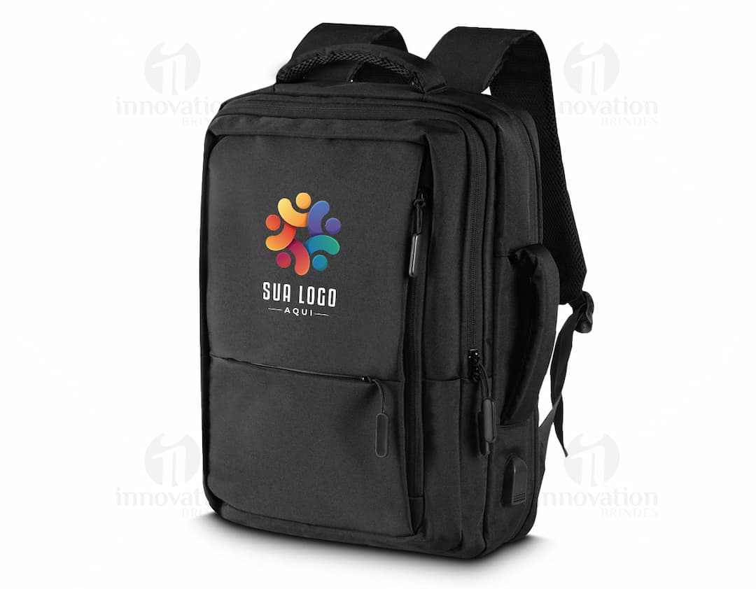 Mochila pasta para notebook preta de couro, com alças e zíperes, ideal para viagens de negócios e para profissionais executivos.