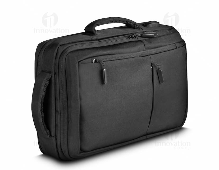 Mochila pasta para notebook em couro preto, perfeita para viagens de negócios. Elegante e moderna, com alça de mão e alça de ombro. Ideal para guardar e transportar seu equipamento com segurança e estilo.