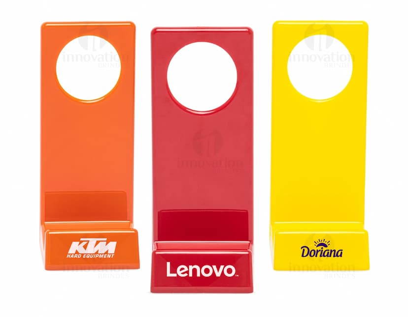 Suporte para Celular em papel em branco com design moderno e iconográfico, ideal para uso em escritórios e lojas. A embalagem vazia e amarela possui elementos gráficos em 3D, com textos e símbolos de comunicação visual.