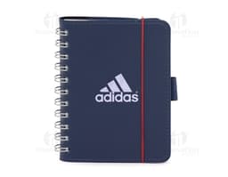 Notebook de couro sintético em branco com capa protetora, utilizado para anotações e organização de documentos no escritório.