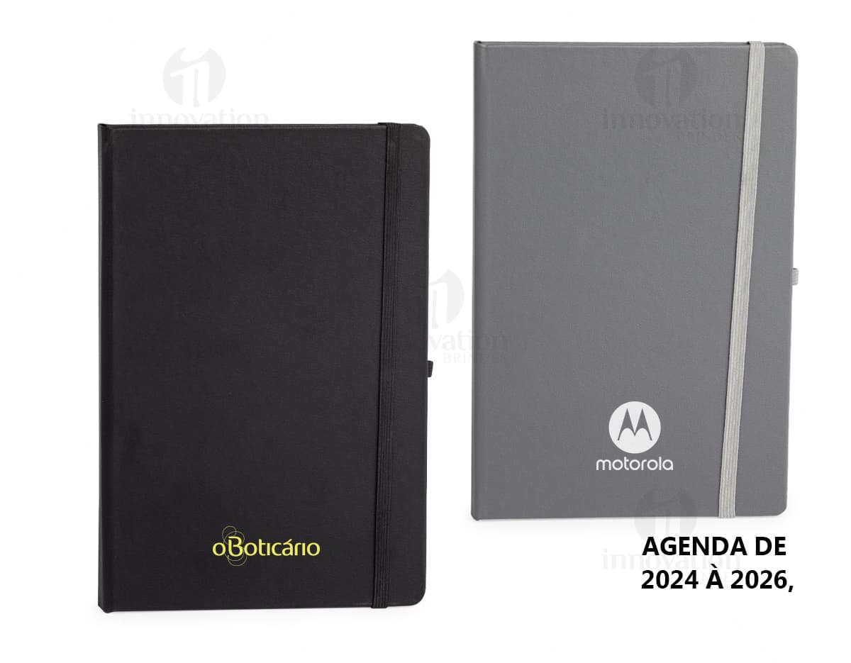 Planner Cromato Anual com capa azul, contendo páginas mensais e semanais com espaço para anotações e planejamento.
