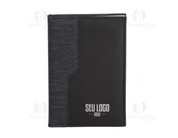 Agenda diária 2025 em formato de notebook preto vazio, com papel em branco, equipamento de tecnologia com mensagem de