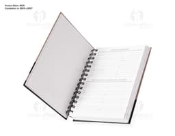 Agenda Diária 2025 com capa dura preta, marcador de página e páginas em branco para anotações.