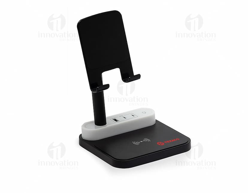 Base de Carregamento para dispositivos eletrônicos, como computador, laptop, celular e tablet. Equipamento moderno e tecnológico com conexão wireless, ideal para carregar diversos aparelhos ao mesmo tempo. Estação de carregamento com design elegante em preto e prata, perfeito para uso em escritórios e em casa.