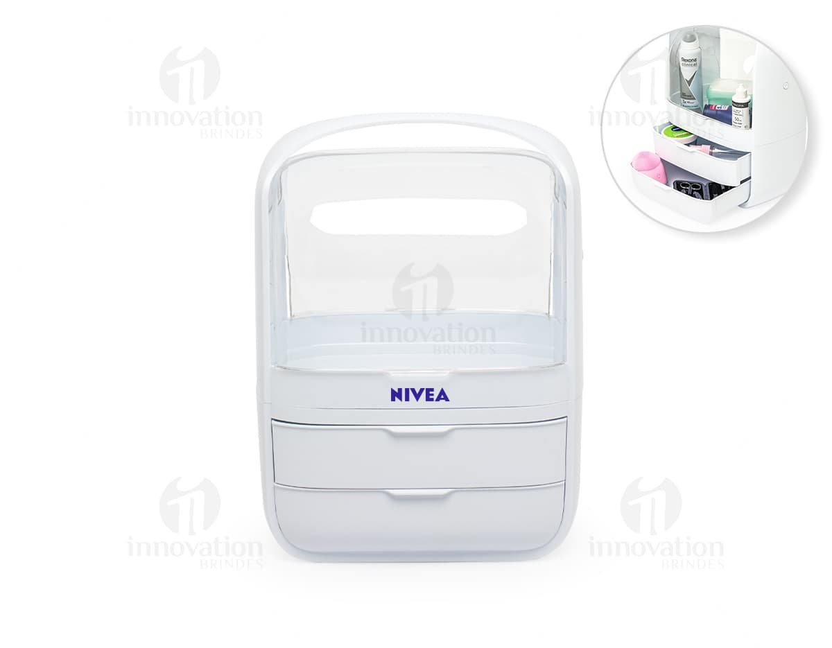 Caixa organizadora de cosméticos em formato de botão quadrado, com chave e sombra. Feito de plástico transparente e moderno, com teclado brilhante e metálico. Possui design simples e brilhante, na cor laranja vibrante e roxo. Ideal para organizar produtos de beleza e protegê-los.